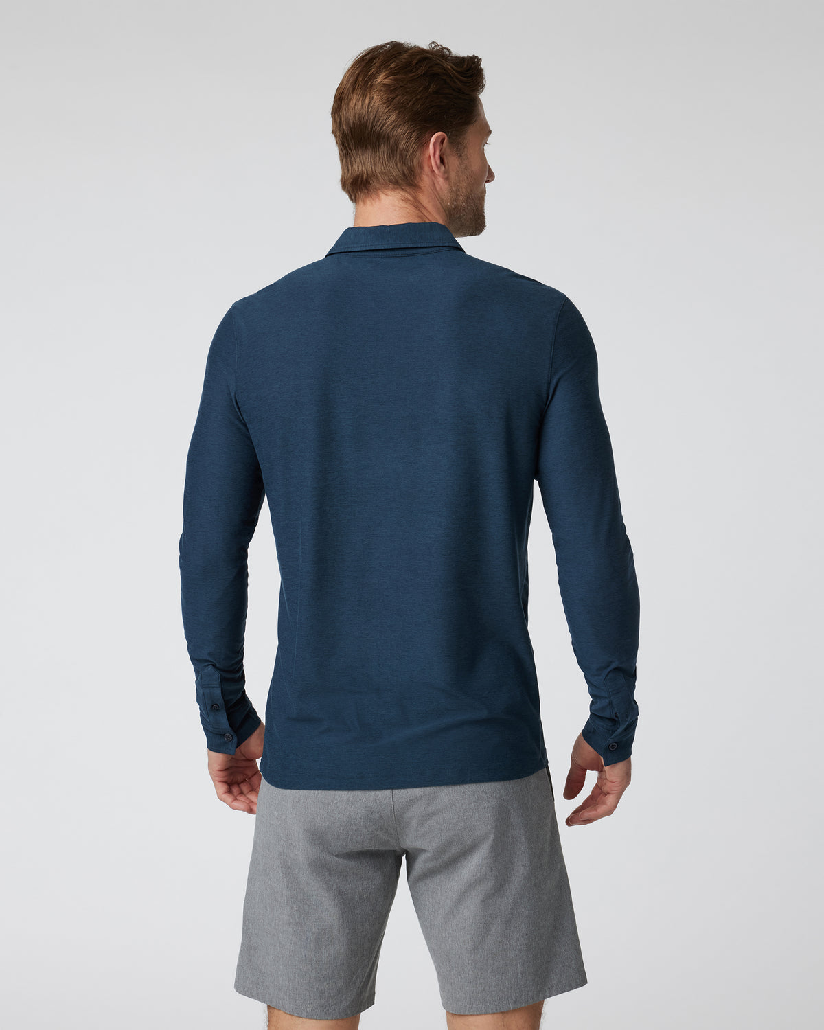 Long Sleeve Strato Tech Polo Navy Heather Blue Polo | Vuori shop